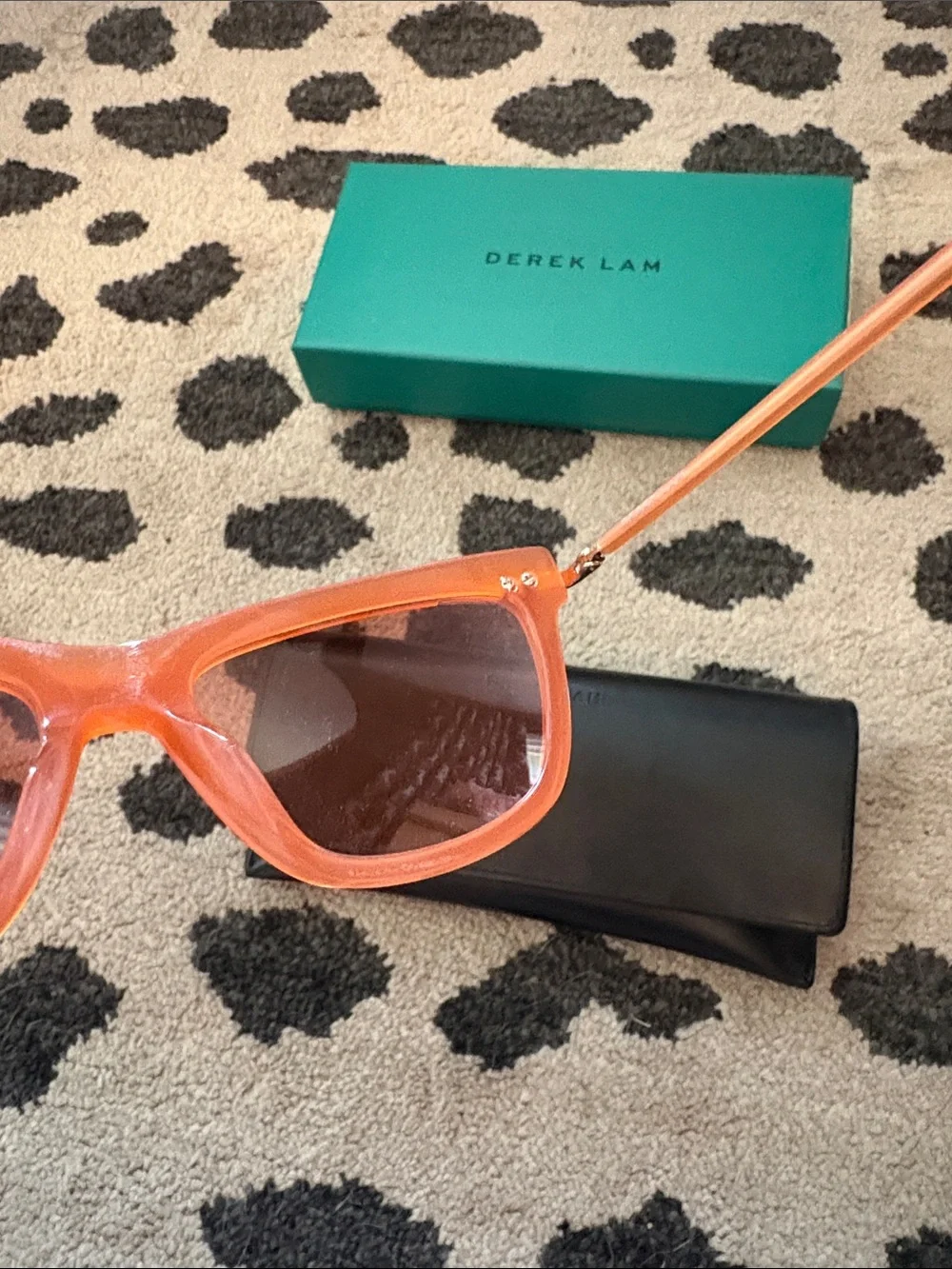 Derek Lam Amber Orange Sunglasses with Black Case